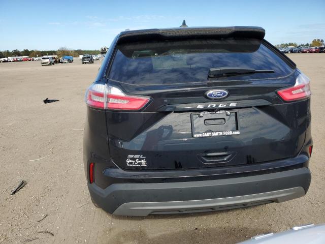 Photo 6 from auction – 2021 FORD EDGE SEL with VIN 2FMPK3J92MBA05580