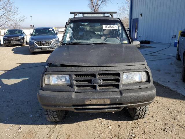 Photo 12 from auction – 1998 CHEVROLET TRACKER with VIN 2CNBJ1369W6912861