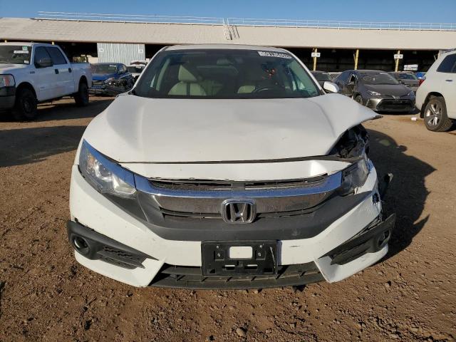 Photo 5 from auction – 2016 HONDA CIVIC EX with VIN 2HGFC1F38GH649304