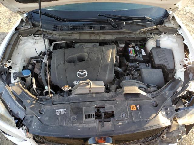 Photo 12 from auction – 2014 MAZDA CX-5 SPORT with VIN JM3KE2BE4E0377041