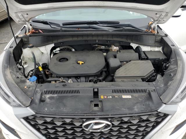 Photo 11 from auction – 2020 HYUNDAI TUCSON SE with VIN KM8J2CA47LU117410