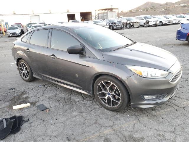 Foto 4 de la subasta – 2015 FORD FOCUS SE con VIN 1FADP3F21FL231977