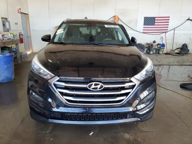 Photo 5 from auction – 2016 HYUNDAI TUCSON LIM with VIN KM8J33A49GU058685