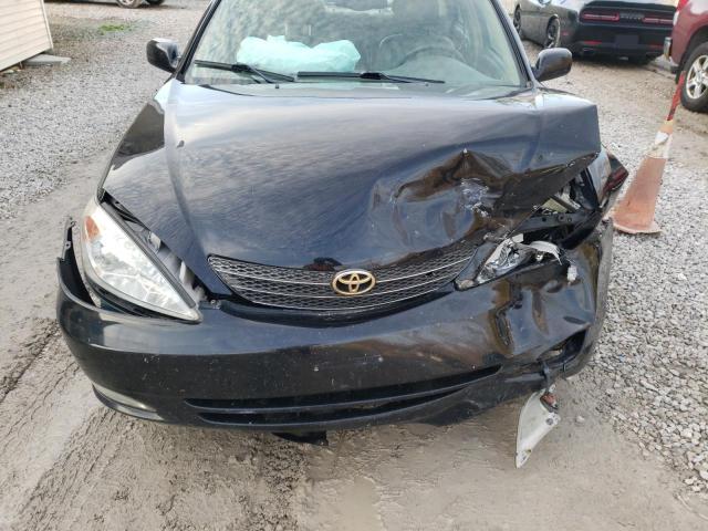 Photo 11 from auction – 2003 TOYOTA CAMRY with VIN 4T1BE30KX3U124282
