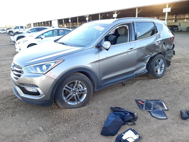HYUNDAI SANTA FE S 2018 with VIN 5NMZU3LB8JH099890 - Photo from auction