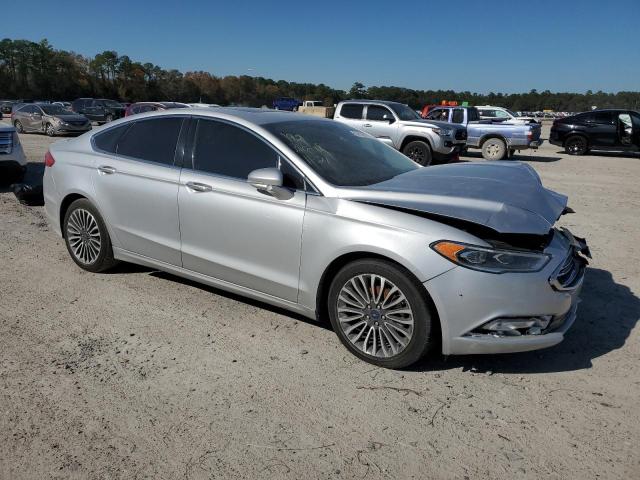 Photo 4 from auction – 2018 FORD FUSION TIT with VIN 3FA6P0D99JR138772