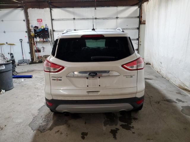 Photo 6 from auction – 2014 FORD ESCAPE TIT with VIN 1FMCU9J98EUE57704