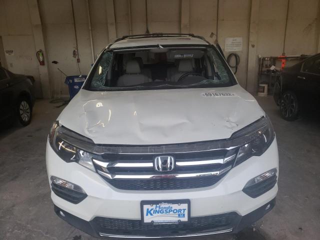 Photo 5 from auction – 2016 HONDA PILOT ELIT with VIN 5FNYF6H02GB004068