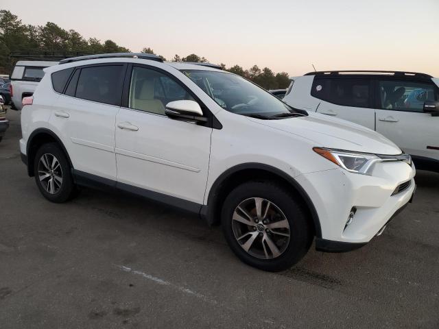 Photo 4 from auction – 2017 TOYOTA RAV4 XLE with VIN JTMRFREV1HJ708262