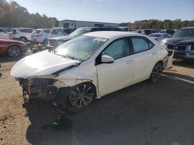 TOYOTA COROLLA L 2017 with VIN 5YFBURHE6HP711009 - Photo from auction