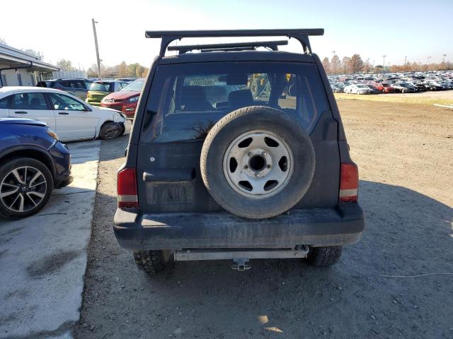 Photo 6 from auction – 1998 CHEVROLET TRACKER with VIN 2CNBJ1369W6912861