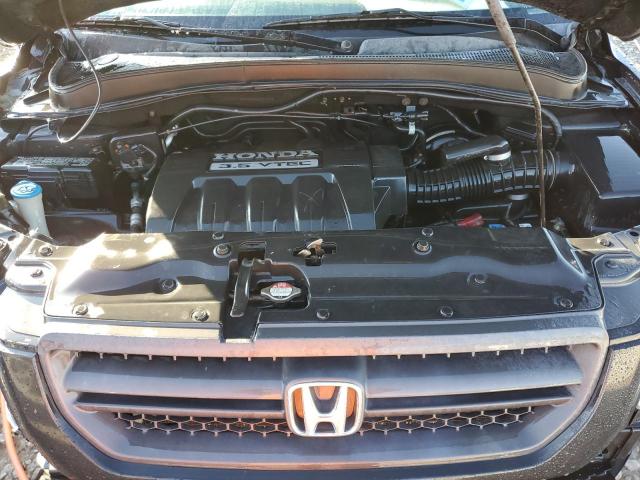 Photo 11 from auction – 2005 HONDA PILOT EXL with VIN 2HKYF18665H559336