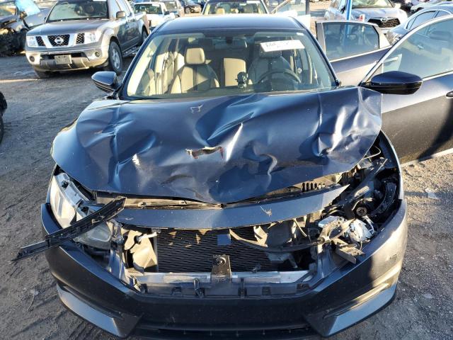 Photo 11 from auction – 2017 HONDA CIVIC LX with VIN 19XFC2F51HE054264