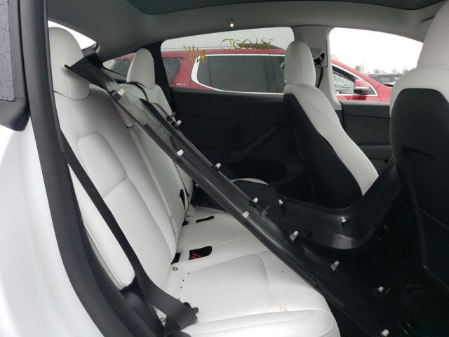 Photo 11 from auction – 2023 TESLA MODEL Y with VIN 7SAYGDEE4PF589949
