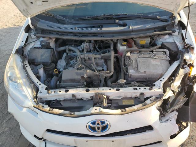 Photo 11 from auction – 2014 TOYOTA PRIUS C with VIN JTDKDTB36E1563867