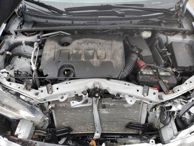 Photo 11 from auction – 2014 TOYOTA COROLLA L with VIN 2T1BURHE4EC046381