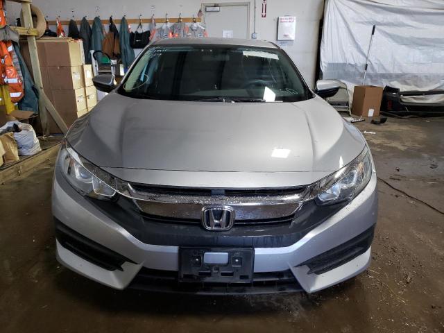 Photo 5 from auction – 2018 HONDA CIVIC LX with VIN 19XFC2F57JE000392