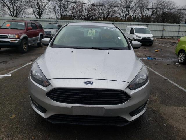 Foto 5 de la subasta – 2018 FORD FOCUS SE con VIN 1FADP3FE0JL203185
