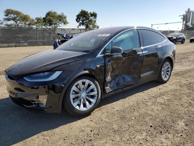 TESLA MODEL X 2018 with VIN 5YJXCDE26JF104647 - Photo from auction