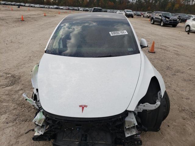 Photo 5 from auction – 2022 TESLA MODEL 3 with VIN 5YJ3E1EC3NF127017