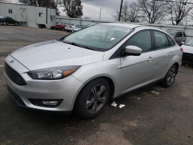 FORD FOCUS SE 2018 with VIN 1FADP3FE0JL203185 - Photo from auction