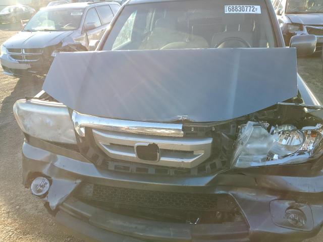 Photo 12 from auction – 2010 HONDA PILOT TOUR with VIN 5FNYF3H88AB011859