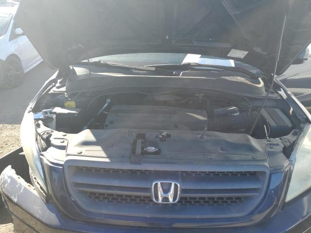 Photo 11 from auction – 2004 HONDA PILOT EXL with VIN 2HKYF18564H533700