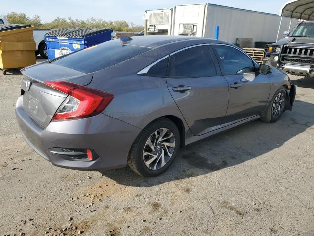 Photo 3 from auction – 2018 HONDA CIVIC EX with VIN 2HGFC2F72JH593487