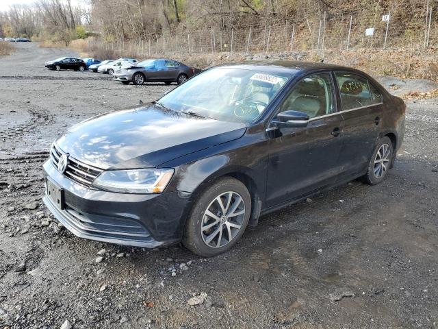 VOLKSWAGEN JETTA SE 2018 with VIN 3VWDB7AJ4JM217848 - Photo from auction