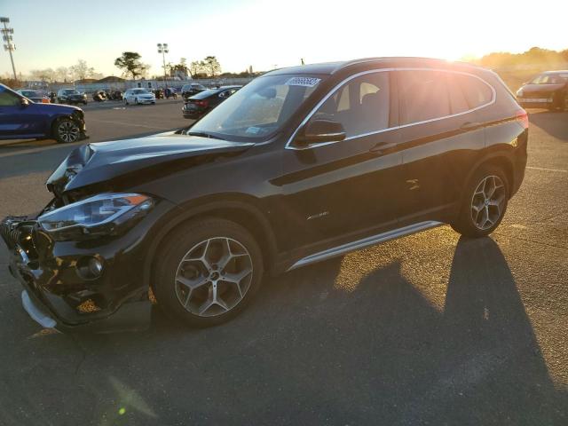 BMW X1 XDRIVE2 2017 with VIN WBXHT3C31H5F79649 - Photo from auction