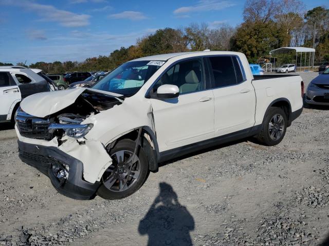 HONDA RIDGELINE 2017 with VIN 5FPYK2F66HB009097 - Photo from auction