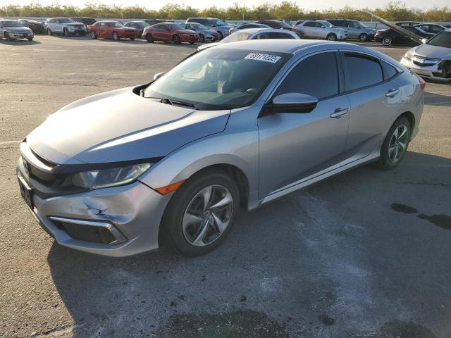 HONDA CIVIC LX 2019 with VIN 19XFC2F62KE208142 - Photo from auction