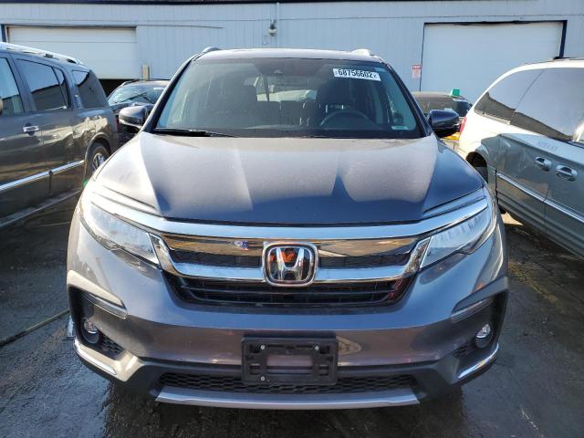 Photo 5 from auction – 2022 HONDA PILOT TOUR with VIN 5FNYF6H60NB021274