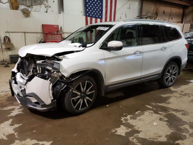 HONDA PILOT ELIT 2021 with VIN 5FNYF6H03MB040802 - Photo from auction