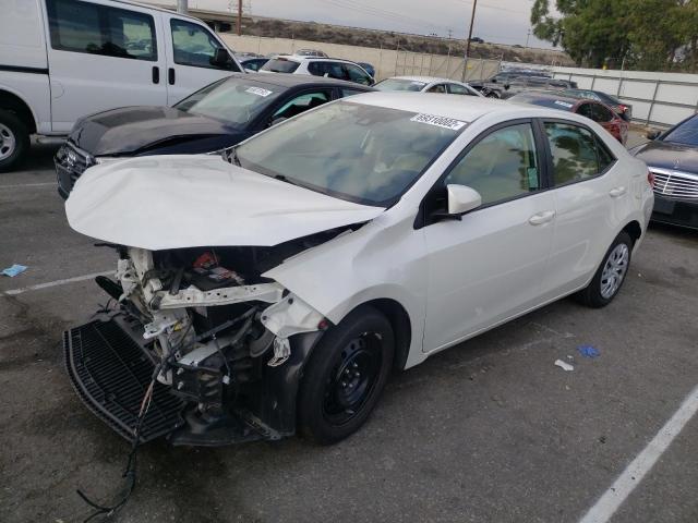 TOYOTA COROLLA L 2017 with VIN 5YFBURHE6HP717764 - Photo from auction