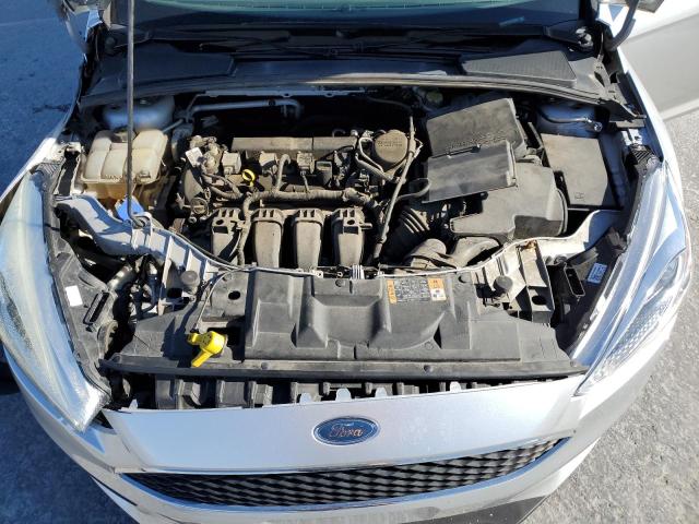 Photo 11 from auction – 2015 FORD FOCUS SE with VIN 1FADP3F23FL347844