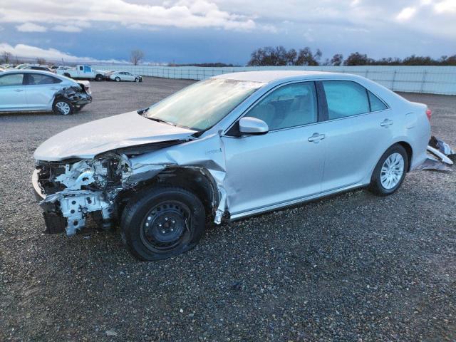 TOYOTA CAMRY HYBR 2014 with VIN 4T1BD1FK7EU107778 - Photo from auction