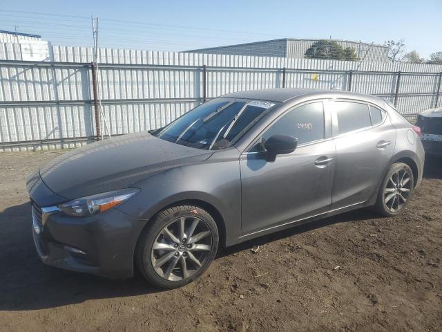 MAZDA 3 TOURING 2018 with VIN 3MZBN1L38JM263757 - Photo from auction