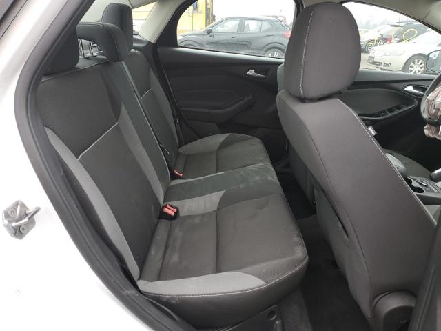 Photo 10 from auction – 2013 FORD FOCUS SE with VIN 1FADP3F29DL243159