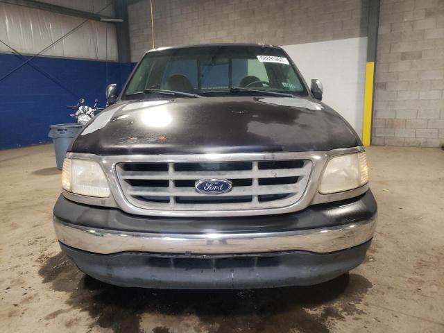 Photo 5 from auction – 2000 FORD F150 with VIN 1FTRF17W1YNA63175