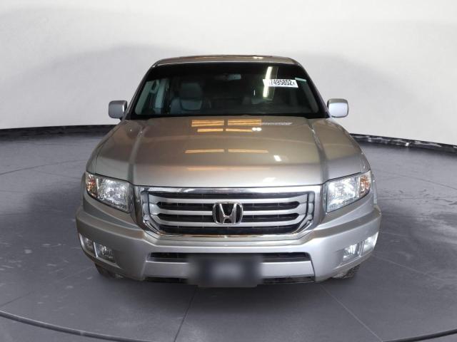 Photo 5 from auction – 2013 HONDA RIDGELINE with VIN 5FPYK1F59DB005847