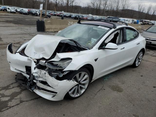 TESLA MODEL 3 2020 with VIN 5YJ3E1EA3LF610518 - Photo from auction