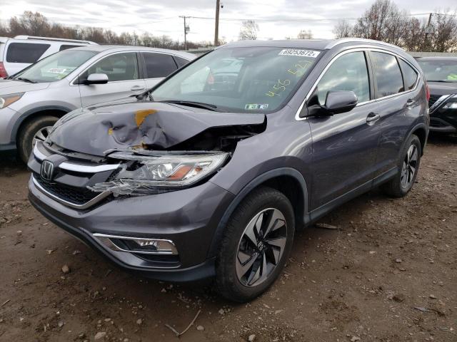 HONDA CR-V TOURI 2016 with VIN 5J6RM4H95GL097298 - Photo from auction