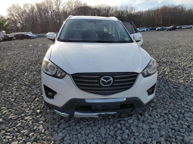 Photo 5 from auction – 2016 MAZDA CX-5 TOURI with VIN JM3KE4CY2G0792558