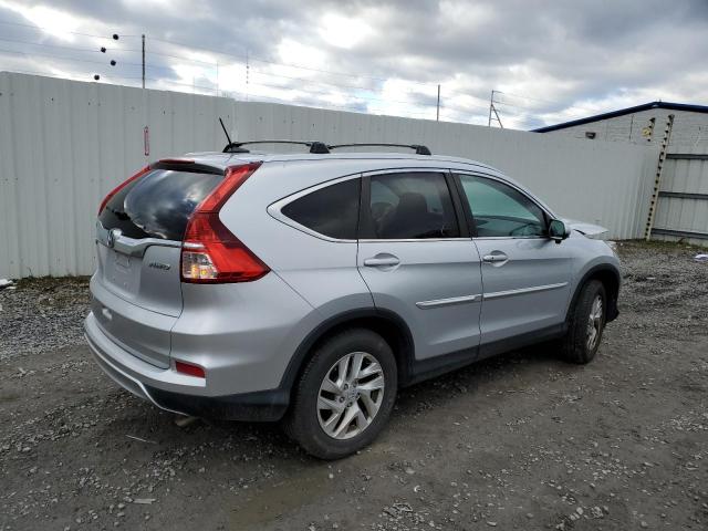 Photo 3 from auction – 2015 HONDA CR-V EXL with VIN 2HKRM4H74FH612296