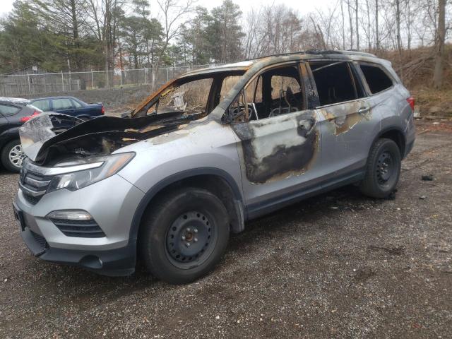 HONDA PILOT EXLN 2018 with VIN 5FNYF6H71JB501035 - Photo from auction