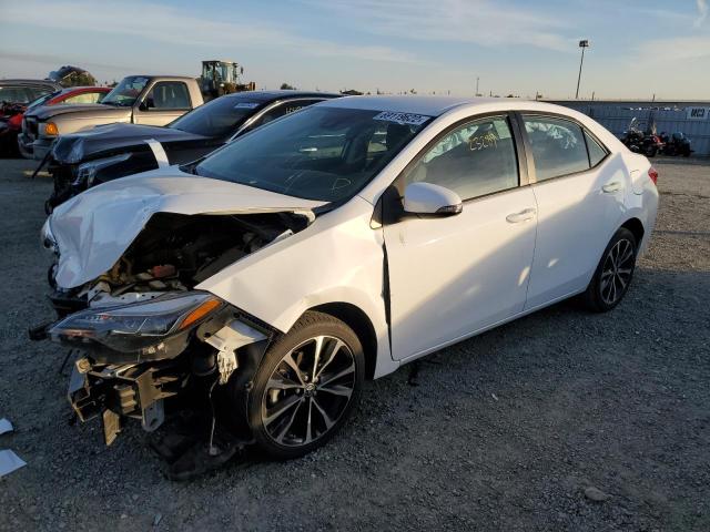 TOYOTA COROLLA L 2017 with VIN 5YFBURHEXHP689046 - Photo from auction