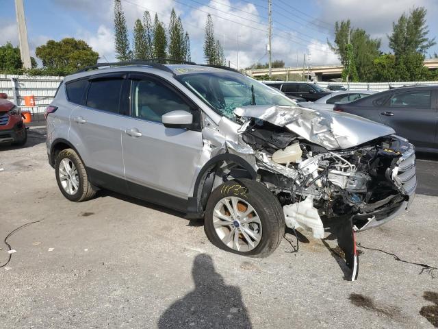 Photo 4 from auction – 2018 FORD ESCAPE SE with VIN 1FMCU0GD0JUB58810