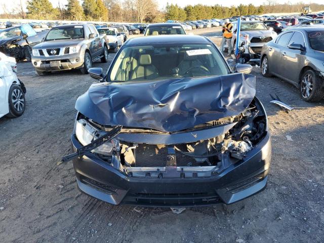Photo 5 from auction – 2017 HONDA CIVIC LX with VIN 19XFC2F51HE054264