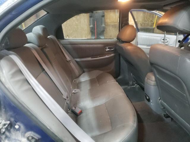 Photo 10 from auction – 2004 KIA OPTIMA LX with VIN KNAGD128545300733